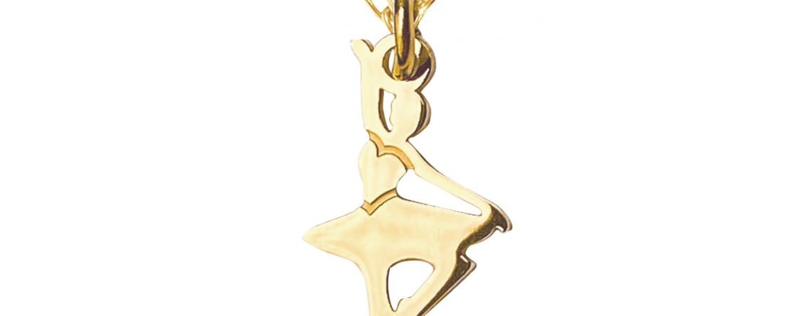 Collier orné d'un pendentif danseuse doré