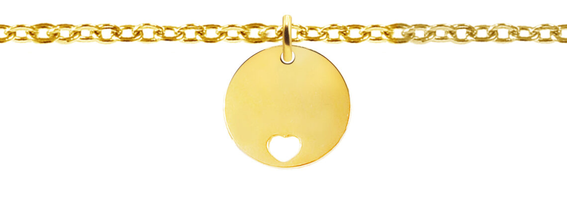 Chaîne de cheville agrémentée d'une médaille ronde avec cœur ajouré en acier inoxydable doré