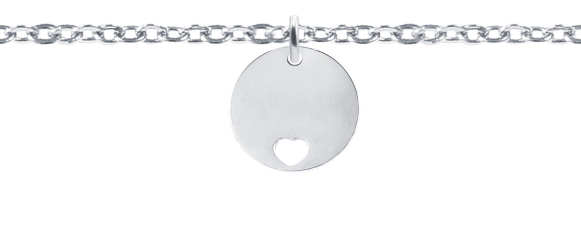 Bracelet chaînette agrémenté d'une médaille ronde avec cœur ajouré en acier inoxydable argenté