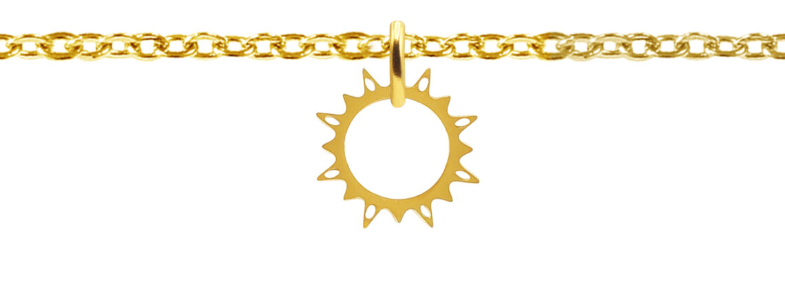 Chaîne de cheville agrémentée d'une pampille soleil en acier inoxydable doré