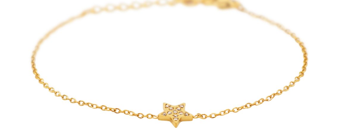 Bracelet étoile rehaussé d'oxydes de zirconium en acier inoxydable doré